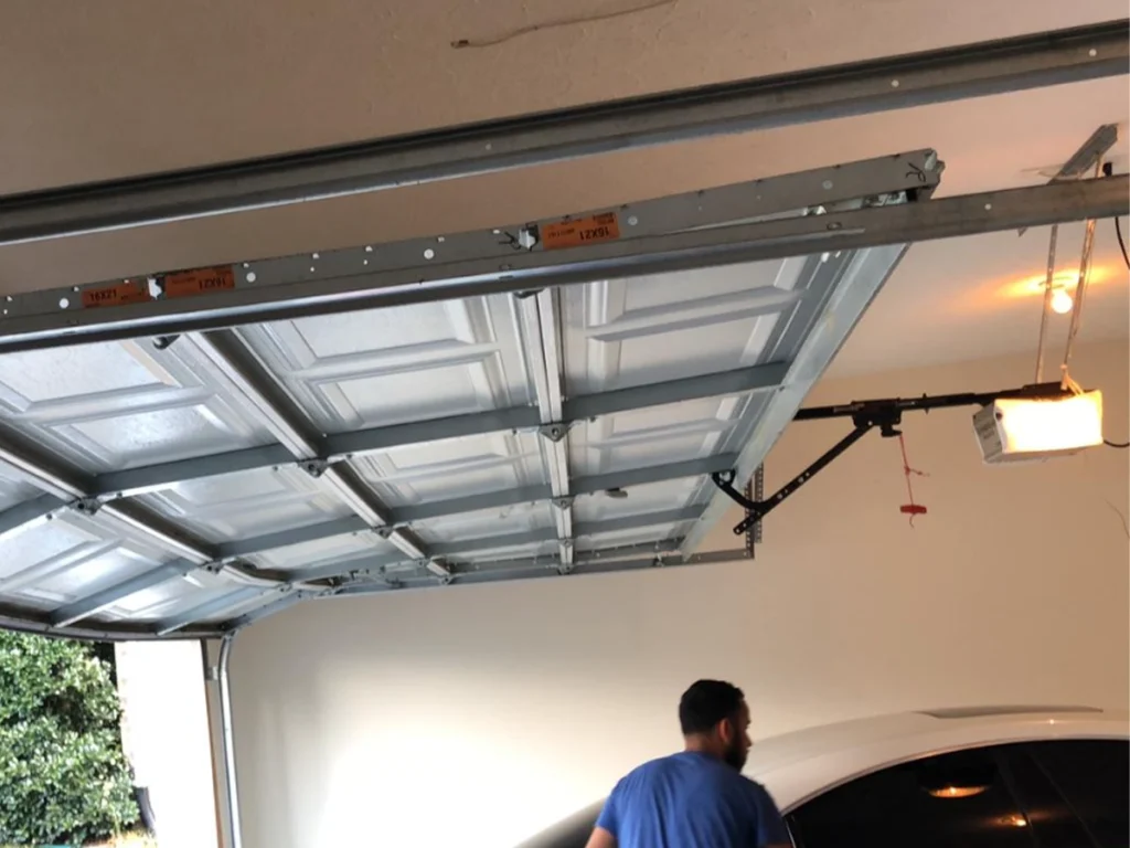 Expert technician applying Proven Garage Door Installation Tricks from Everlast Garage Doors in Franklin, TN