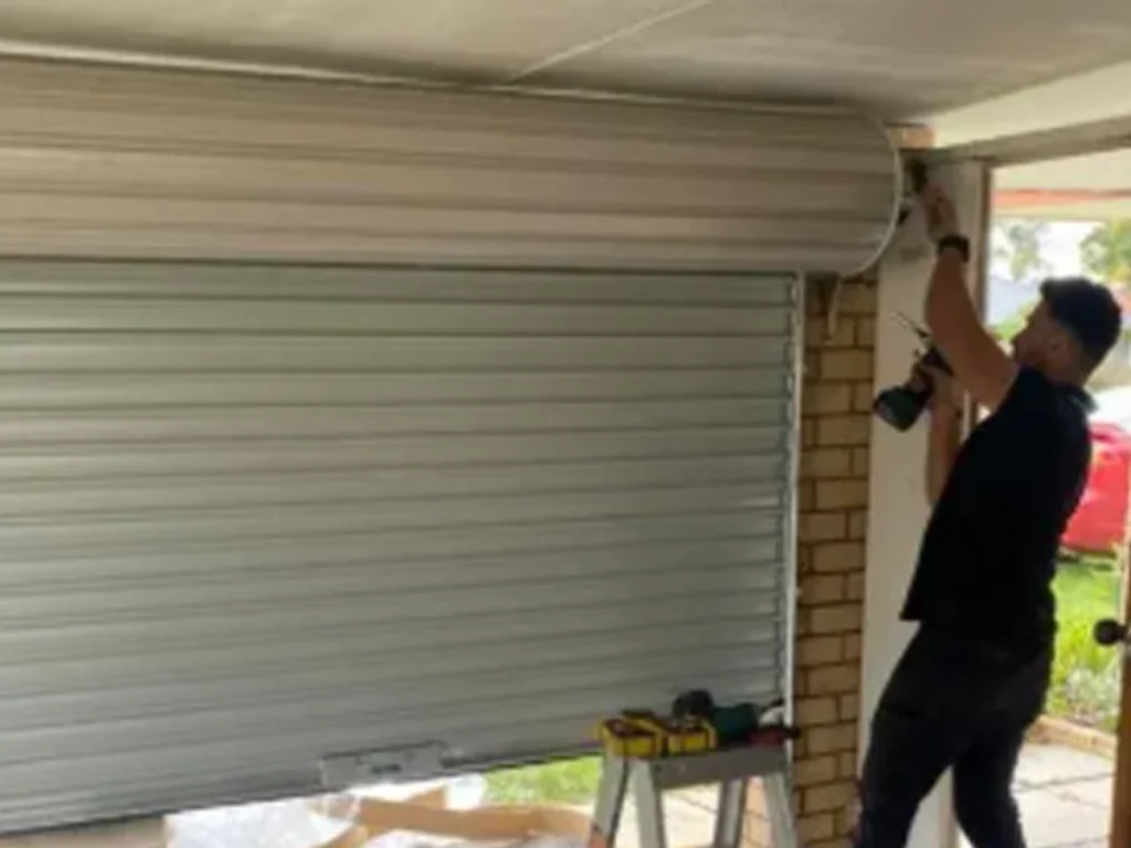 Technician performing fast and reliable garage door repair in Franklin by Everlast Garage Doors