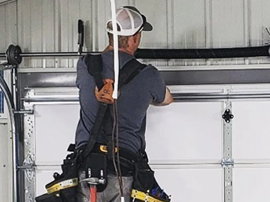 Technician providing reliable emergency garage door services in Franklin, TN by Everlast Garage Doors