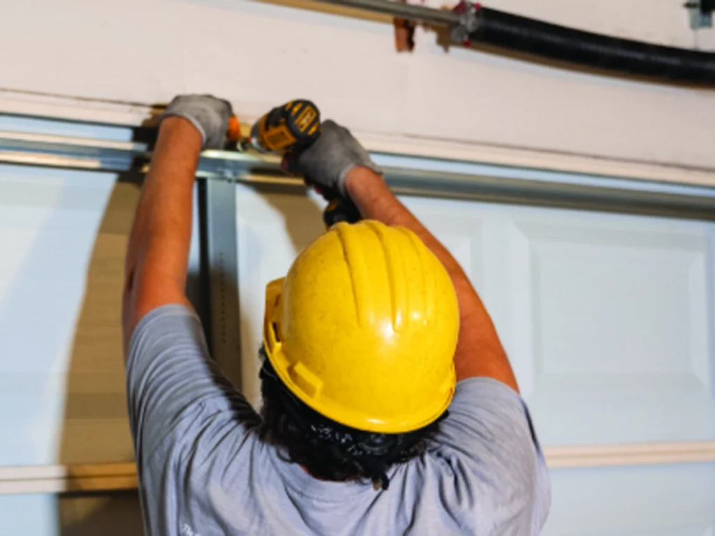 Everlast Garage Doors technician performing emergency repair in Franklin, TN