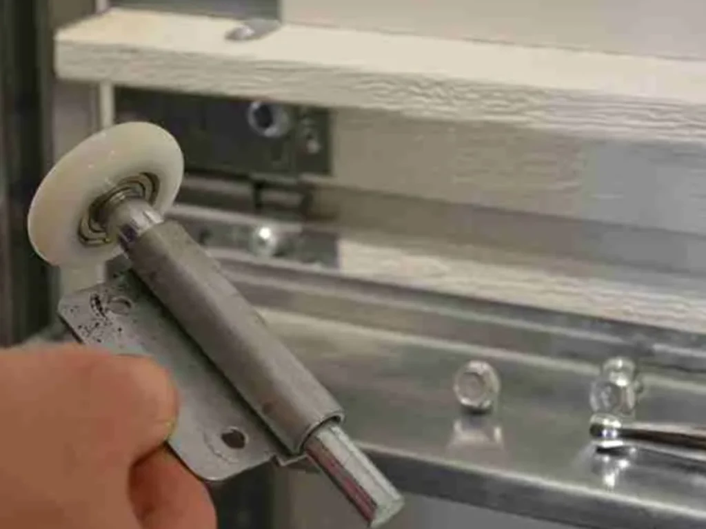 Guide to Garage Door Rollers, Hinges, and Tracks by Everlast Garage Doors in Franklin TN