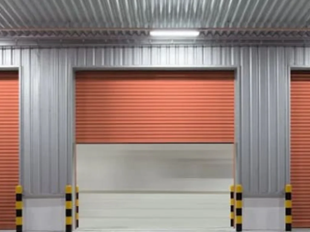 commercial garage door services Franklin TN technician inspecting a dock door system