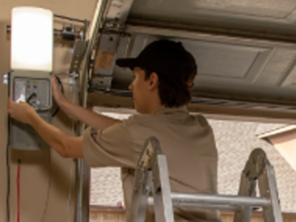 emergency garage door repairs Franklin TN service van outside a Franklin home