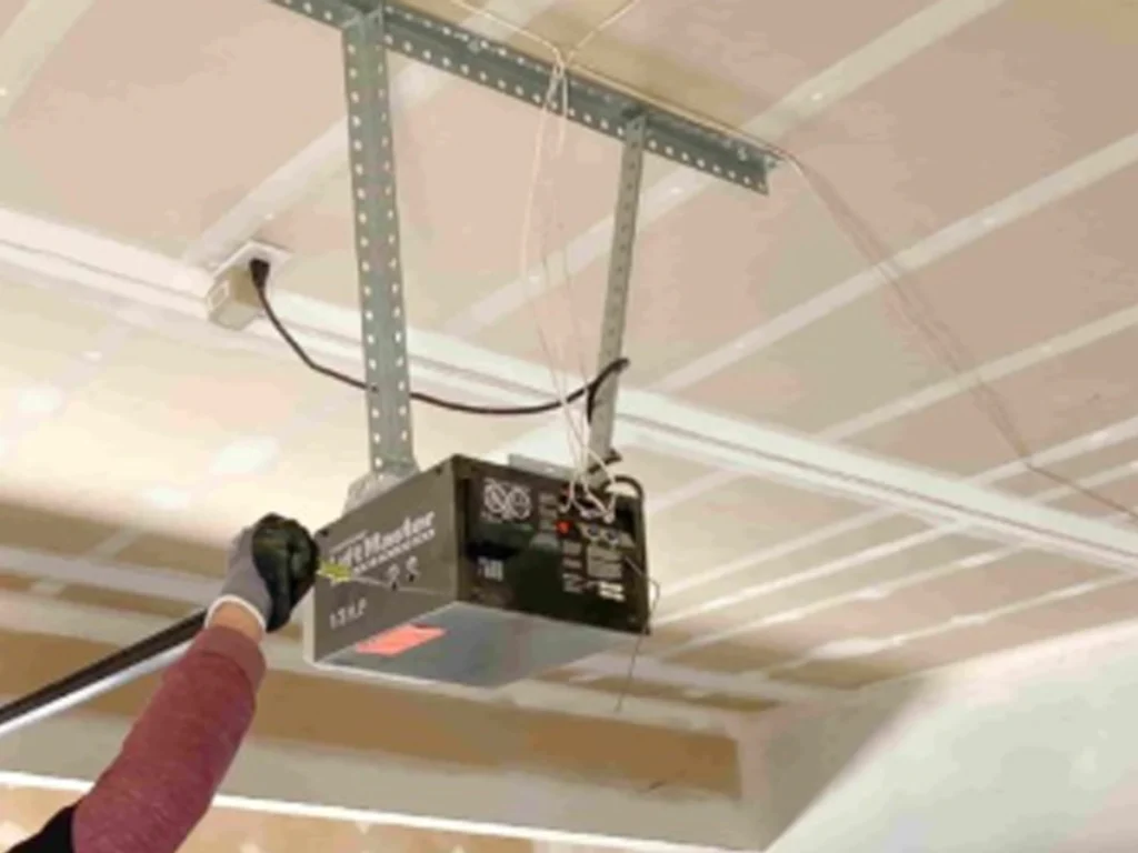 Garage Door Repair Franklin TN technician checking springs and rollers