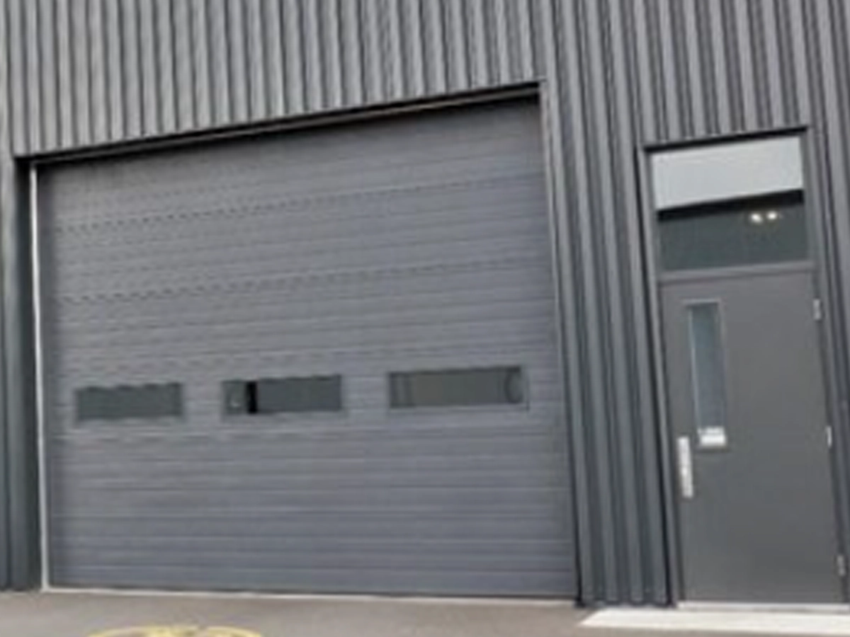Garage Door Services Simple Builds Strong Franklin Success with a commercial garage door technician checking tracks and hardware