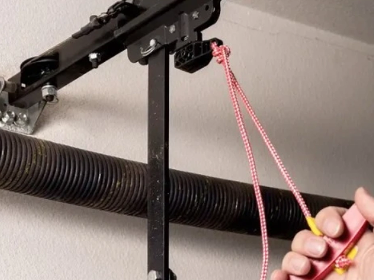 Garage door automated emergency response system with safety sensors, alerts, reversal controls, and backup power in Franklin