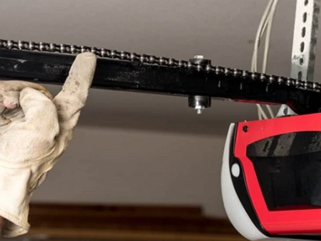 Chain Drive vs. Belt Drive Garage Door Openers compared inside a Franklin residential garage
