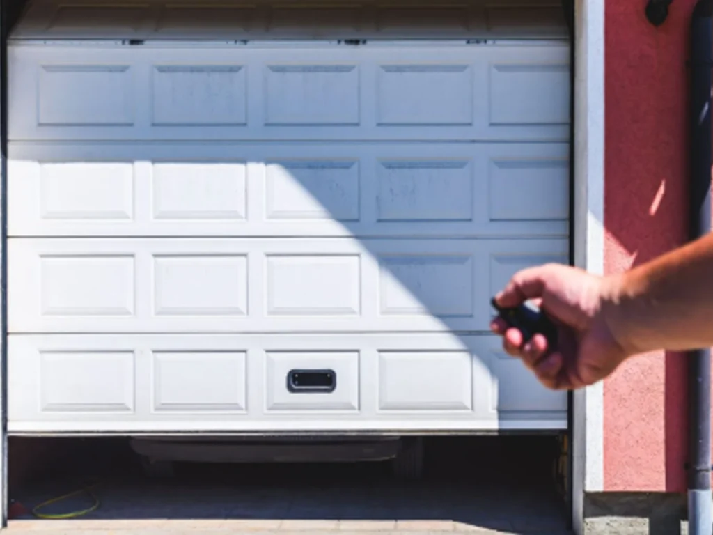 Energy monitoring for smart garage doors with maintenance data displayed beside a modern garage door opener in Franklin TN